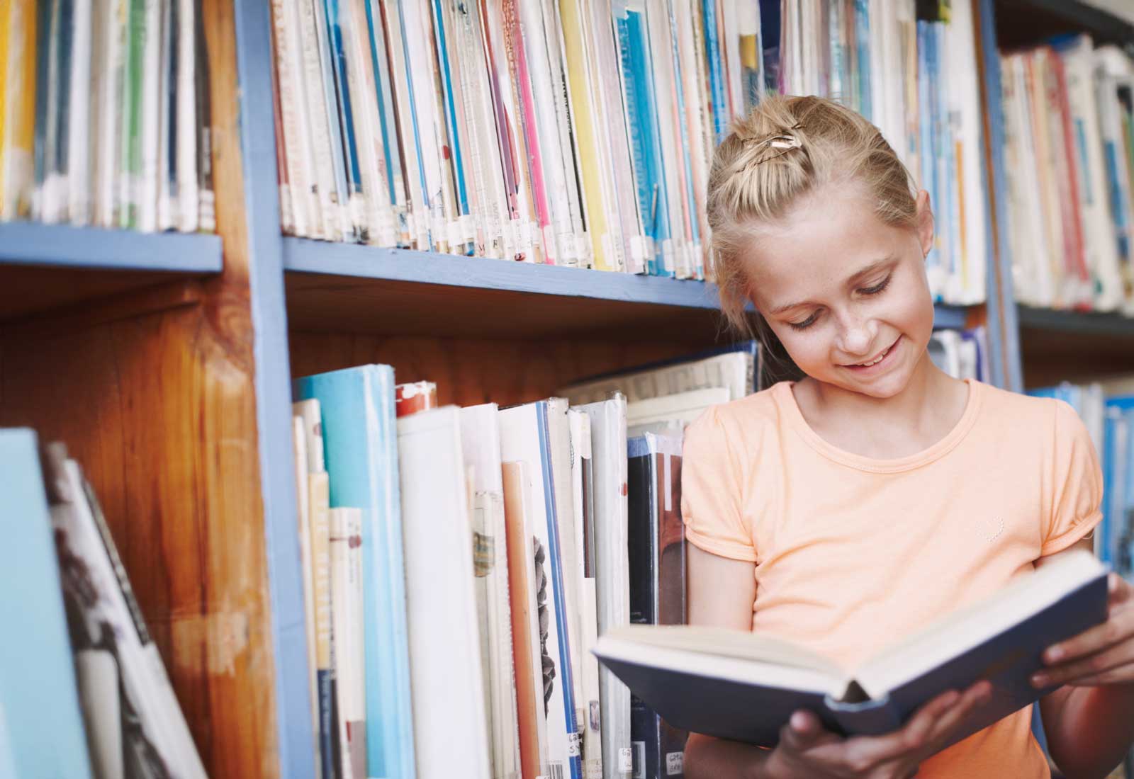 School girl in library