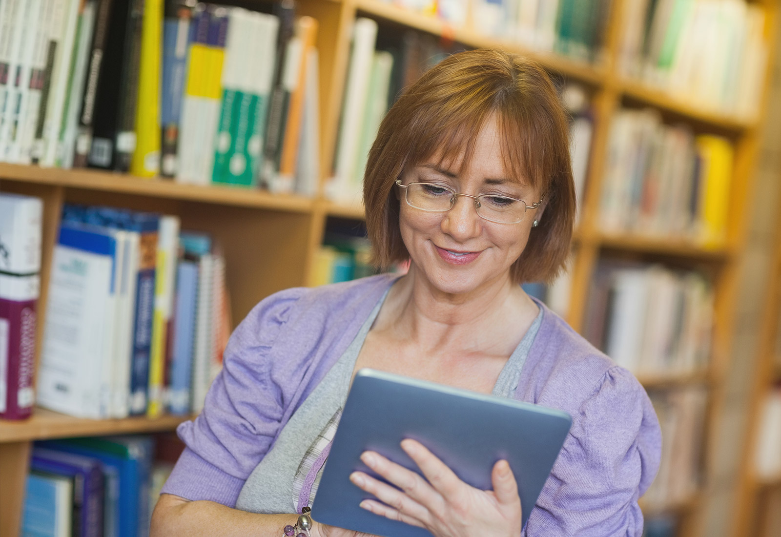 Librarian using Tablet